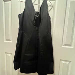 Never worn Limited pleated black dress. Size 12.